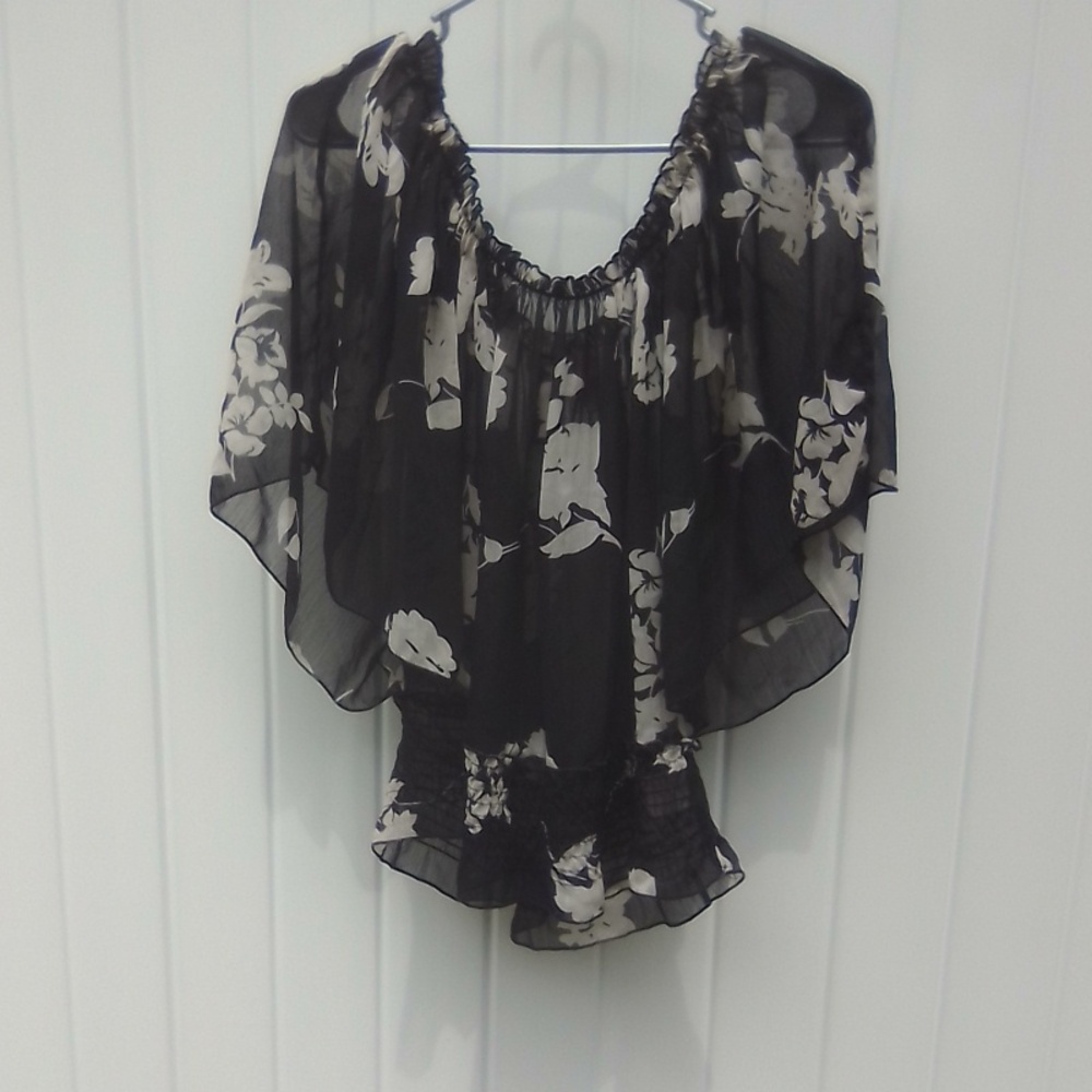 Fun sheer floral blouse.